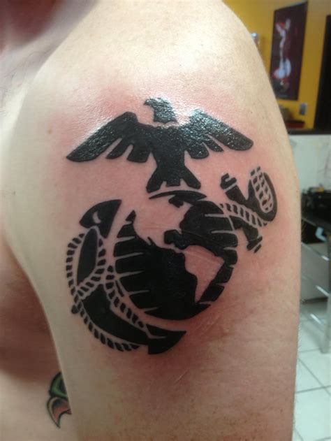 blood eagle tattoo|eagle globe and anchor tattoos.